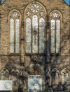 The sunshine lights through the glass window frame and old wall exterior architecture of The cathedral church Royalty Free Stock Photo