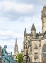 David Hume Statue and church buildings,along Edinburgh Royal Mile Royalty Free Stock Photo