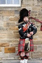 EDINBURGH, SCOTLAND, 24 March 2018 , Scottish bagpiper dressed i Royalty Free Stock Photo