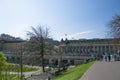 View of The Scottish National Gallery or National Gallery of Scotland, the neoclassical building, people interacting with a art