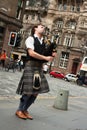 Edinburgh street bagpiper Royalty Free Stock Photo