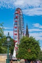 Princes Street Gardens with a Ferris Wheel and Scott Monument in Royalty Free Stock Photo
