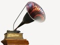 Sound horn on Edison gramophone is colorful & huge. This version with turntable is isolated. Royalty Free Stock Photo