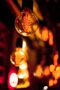 Edison lamp on a black background. Incandescent lightbulb with a dark background with bokeh Royalty Free Stock Photo