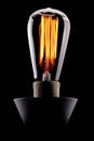 Edison light bulb glowing Royalty Free Stock Photo