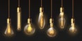 Edison light bulbs. Hanging vintage pendant copper lamps with glowing lightbulb filament. 3d decorative bulb on electricity wire Royalty Free Stock Photo