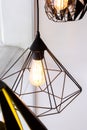 Edison's light bulb and lamp in modern style coffee shop. warm tone photo Royalty Free Stock Photo