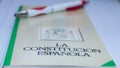 Book of the spanish constitution wiht a pen and the graphical white background