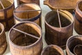 EDITORIAL buckets and wooden barrels in antique fair