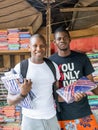 Unidentified street vendors waiting for tourists in front of their fabric stall, Sandaga Market Royalty Free Stock Photo