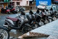Editorial dated:27th feb`2021 location : dehradun ,INDIA. Two wheelers parked on a footpath during rains