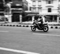 Editorial, Dated 14thJuly2020, Location Dehradun INdia. A black and white shot of a person riding on a motor cycle in speed on an