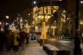 Editorial. December, 2022. Warsa New year 2023. Glowing decorations near a Christmas tree in Warsaw