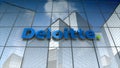 Editorial, Deloitte Touche Tohmatsu Limited logo on glass building.