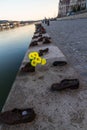 Editorial, early morning, the holocaust memorial Shoes on the Danube Bank, portrait, Budapest