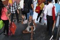 Editorial: Gurgaon, Delhi, India: 06th June 2015: An unidentified old poor man begging from people at Gurgaon,Delhi M.G Road Metro