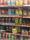 A display of lays chips in a grocery store showing the wide array of flavours