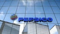 Editorial Pepsico logo on glass building.