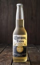 Editorial photo of bottle of Corona Extra Beer on dark wooden background Royalty Free Stock Photo