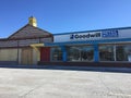 Editorial photo of a empty parking lot in front of a goodwill retail store