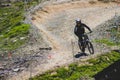 A mountain biker going down whistler mountain, Canadas most iconic mountain for downhill sports