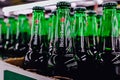 Editorial selective focus photo of Heineken beer bottles - a brand of Dutch beer