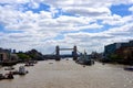 Editorial: 21st June 2015, London, UK, Tower Bridge with blue and cloudy sky and tourists enjoying the magnificent historic bridge