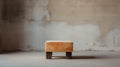 Editorial Style Photograph Of Footstool In Simple Brutalist Environment