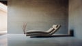 Editorial Style Photograph Of Grey Chaise Lounge In Simple Brutalist Environment