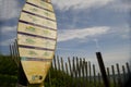 editorial surfer rules on surf board with Ditch Plains beach background Montauk