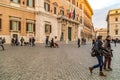 EDITORIAL tourists walking in Piazza Montecitorio in Rome