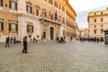 EDITORIAL tourists walking in Piazza Montecitorio in Rome