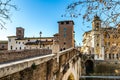 EDITORIAL tourists walking on Pons Fabricius in Rome