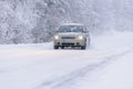 Editorial: Tuupovaara City, Finland, 25th December 2018. Toyota car on the road number 496 with heavy snow in winter season at Royalty Free Stock Photo