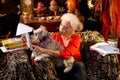 Author Heloise In Her Living Room With Her Dog Cabbie