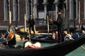 Italy- Venice- A Gondola and Boat Traffic Jam on the Grand Canal Royalty Free Stock Photo