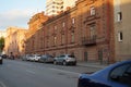 City landscape: 22 Pervomaiskaya street, the building of red brick at sunset. School of Music.