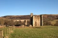 Edlingham Castle and old arched bridge in winters sunshine