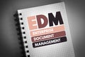 EDM - Enterprise Document Management acronym on notepad, business concept background Royalty Free Stock Photo