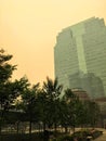 A view of the orange smoky hazy skies and the subsequent red sun above downtown Edmonton, Alberta, Canada due to the ongoing for