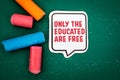 Only the educated are free. Speech bubble on a green chalkboard Royalty Free Stock Photo