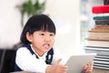 Educated little Chinese girl in class Royalty Free Stock Photo