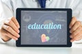 Education against medical biology interface in blue Royalty Free Stock Photo