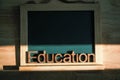 Education alphabet Wooden letters on mini blackboard