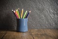 Education and back to school concept with pencils colorful in a pencil case on dark background - Wooden Crayon Royalty Free Stock Photo