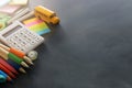 Education and back to school concept. stationery and bus over classroom blackboard. top view, flat lay Royalty Free Stock Photo