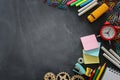 Education and back to school concept. stationery and bus over classroom blackboard. top view, flat lay Royalty Free Stock Photo