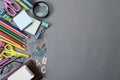 Education or back to school Concept. Top view of Colorful school supplies with books, color pencils, calculator, pen cutter clips Royalty Free Stock Photo