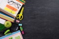 Education or back to school Concept. Top view of Colorful school supplies with books, color pencils, calculator, pen cutter clips Royalty Free Stock Photo