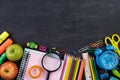 Education or back to school Concept. Top view of Colorful school supplies with books, color pencils, calculator, pen cutter clips Royalty Free Stock Photo